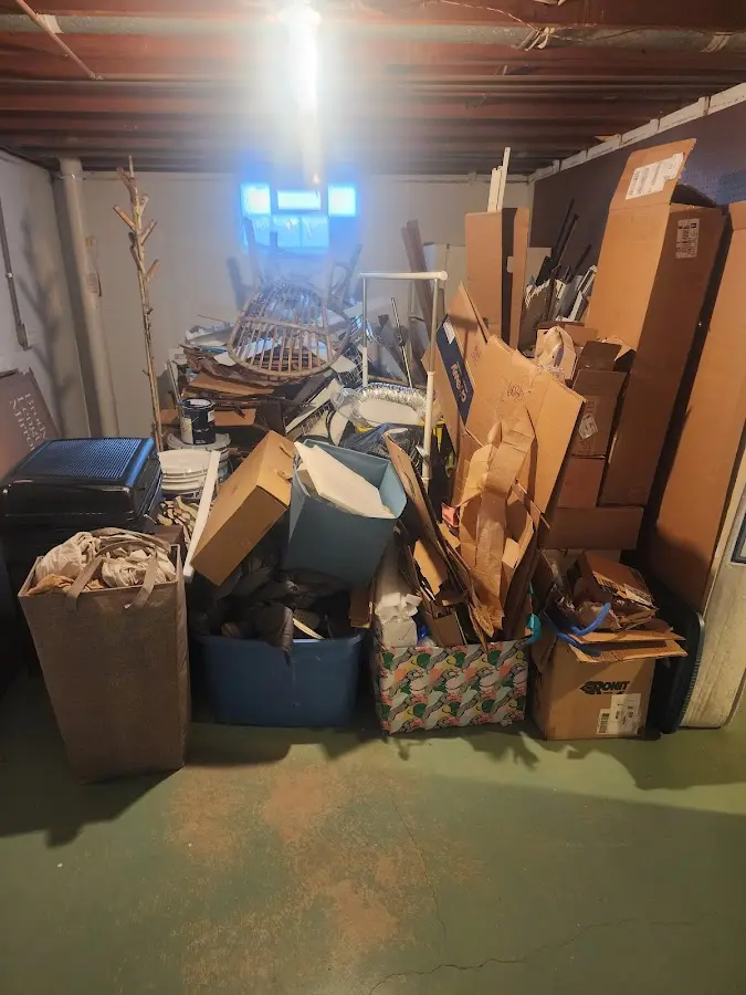 Roll-off dumpster container at job site for 2 Yard Dumpster Rental in Captain Cook